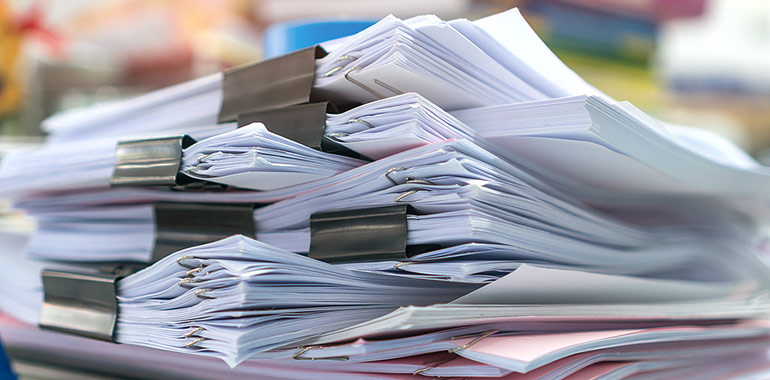Pile de documents juridiques — réécriture de déclaration de copropriété